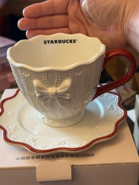 Starbucks White Embossed Bow Teacup & Saucer with Red Handle  Asia exclusive
